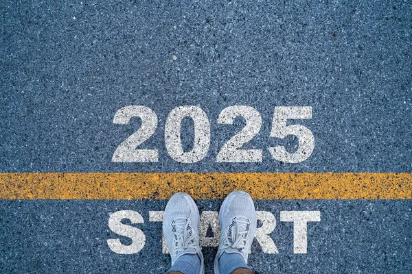 Runner standing at the starting point with 2025 year for starting in new year 2025 to achieve business planing and success concept.