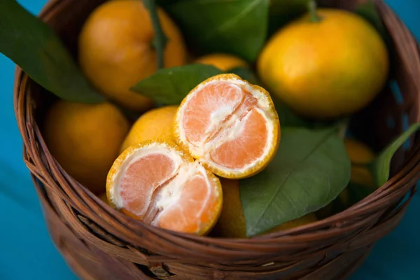 Tangerines Mandarins Leaves Basket Turquoise Wooden Background — Stock Photo, Image