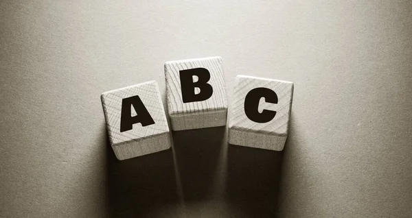 Alphabet English Word Written on Wooden Cubes