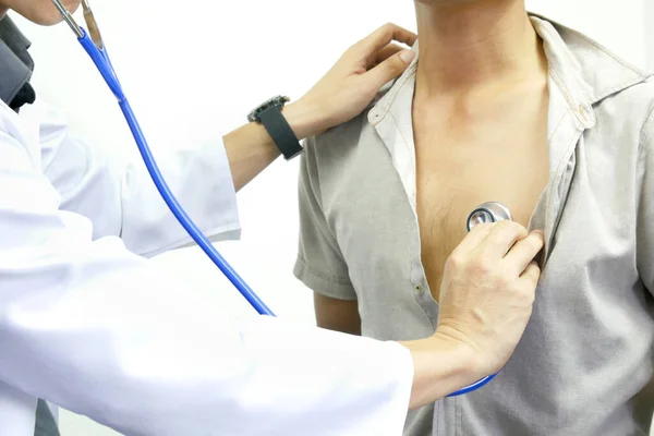 Hands of doctor male check up health by a stethoscope.check  heart rate .Health concept