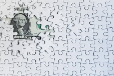 Kayıp yapboz parçaları para dolar geçmişi, iş çözümü konsepti, başarı için anahtar