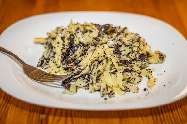 Hungarian traditional meal pasta with poppy seeds and sugar