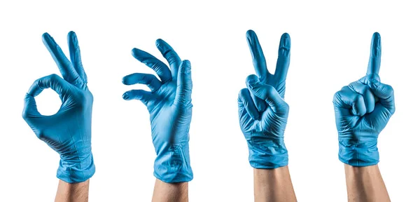 Niektóre Ręce Niebieską Rękawicą Lateksową Wykonując Różne Gesty — Zdjęcie stockowe