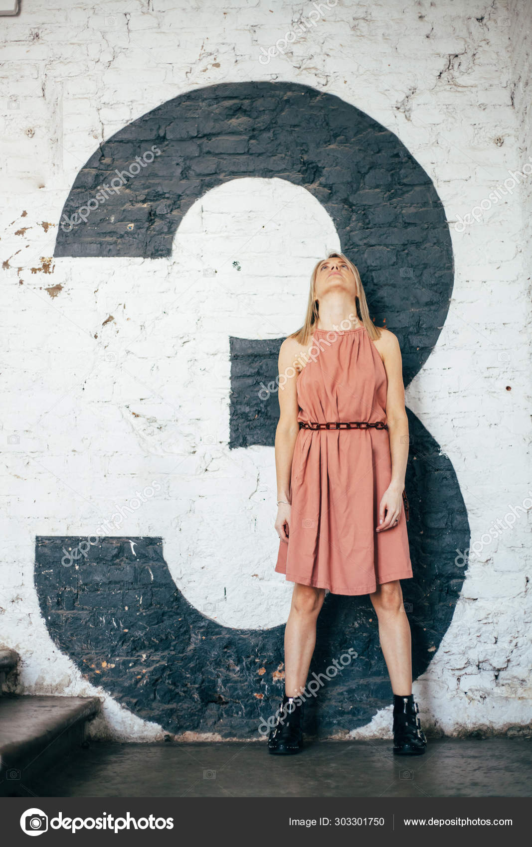 pink dress with black boots