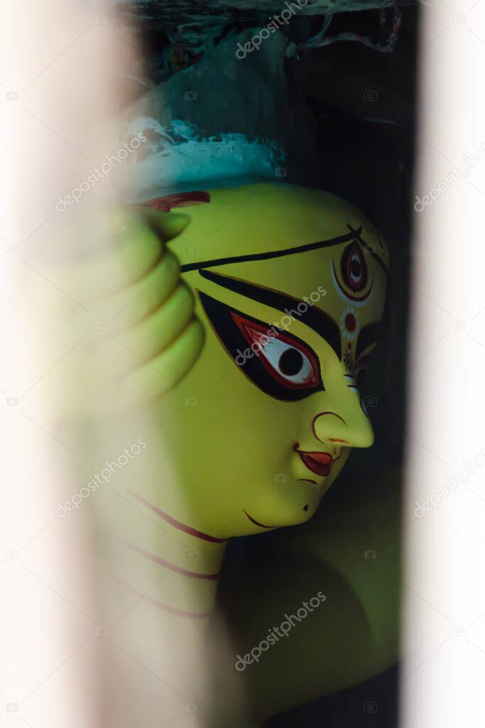 Beautiful idol of Goddess Durga with use of selective focus