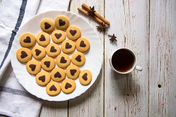 Top View Chocolate Chip Heart Shaped Cookies Cinnamon Sticks Cup — Stock Photo, Image