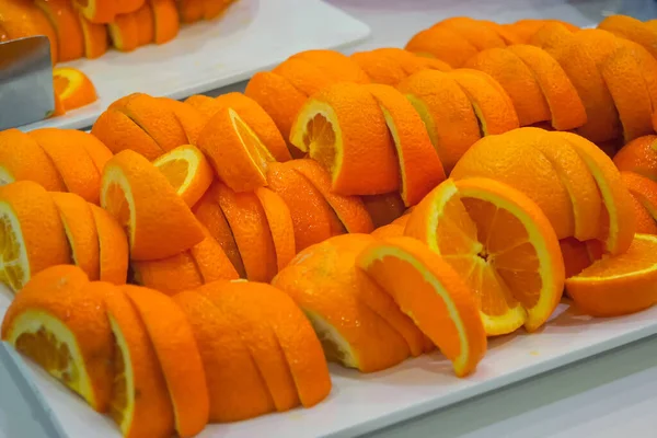 fresh orange slices on a plate, organic food, healthy nutrition