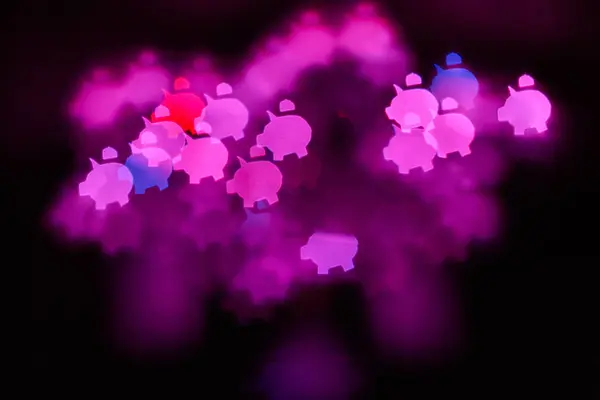 Pembe rakamlar bokeh bir led ışık arka plan üzerinde domuz yavruları şeklinde