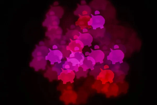 Pembe ve kırmızı rakamlar bokeh domuzcuklar backgro üzerinde şeklinde