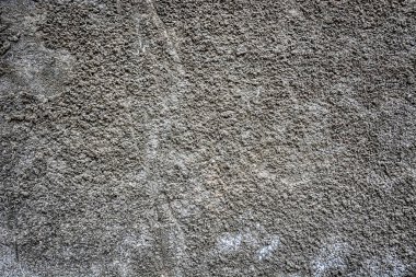 Eski çimento duvar. Granit kadar dekoratif yakın doku. Kavram ya da proje için arka plan.