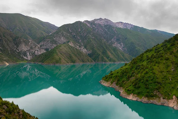 Beautiful mountain turquoise color lake Karasuu. Kyrgyzstan.