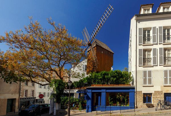Old windmill Moulin de la Galette in Montmartre. Paris, France.