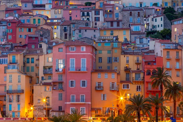 stock image Menton. Antique multi-colored facades of medieval houses on the shore of the bay.