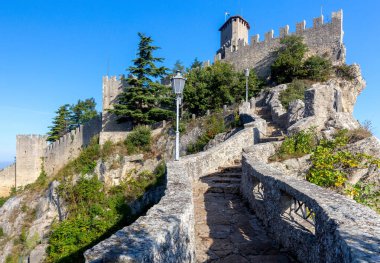 San Marino. Old stone towers on top of the mountain. clipart