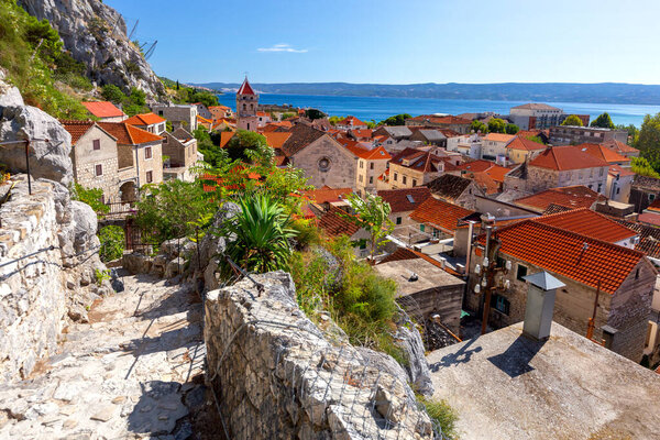 Old street in Omis city on a sunny day.