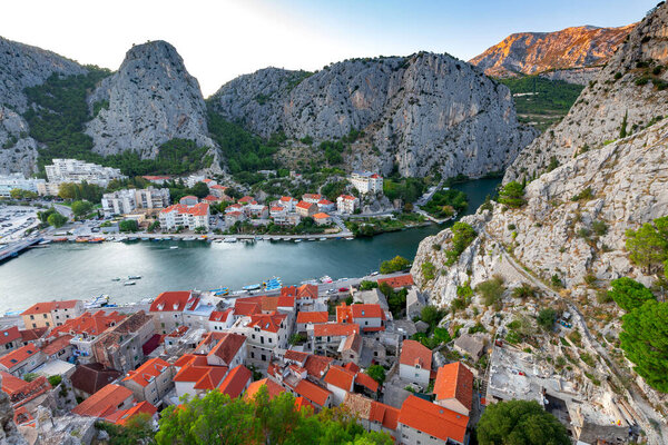 Aerial view of the old medieval historic city at sunset. Omis. Croatia.