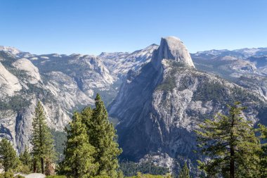 Glacier Point at Yosemite National Park offers breathtaking views of the valley clipart