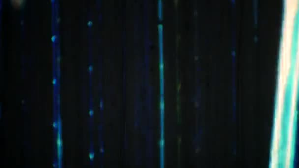 Lignes bleues avec rayures et poussière sur un film vintage 8 mm