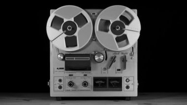 Eski bir Vintage Reel to Reel şarkısının film çekimi. Müzik çalıyor.