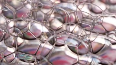 Renkli parlak kabarcıklar ve gökkuşağı renklerinin makro çekimi