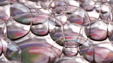 Renkli parlak kabarcıklar ve gökkuşağı renklerinin makro çekimi