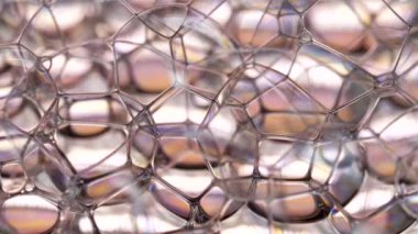 Renkli parlak kabarcıklar ve gökkuşağı renklerinin makro çekimi