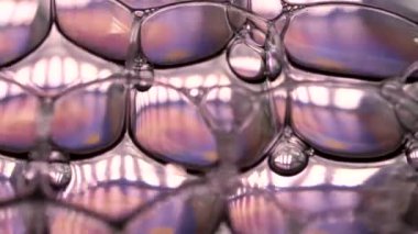 Renkli parlak kabarcıklar ve gökkuşağı renklerinin makro çekimi