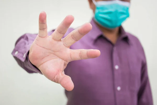 Male Hand Making Stop Covid Sign Gesture While Wears Medical — Stock Photo, Image