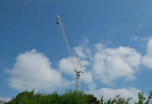Tower crane with a basket for jumping. High jump