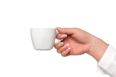 Kadın el ile beyaz bir fincan