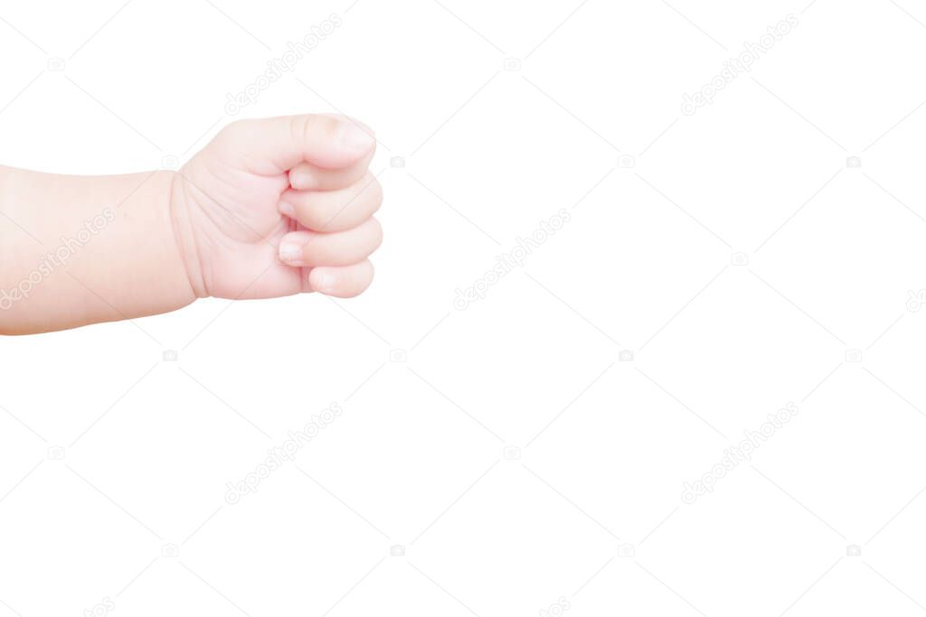 The hand of the infant baby in the age of three months Showing fist gesture isolated on white background