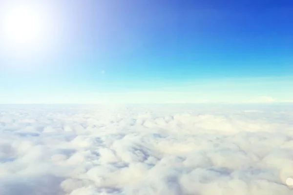 sky above cloud with white sun background