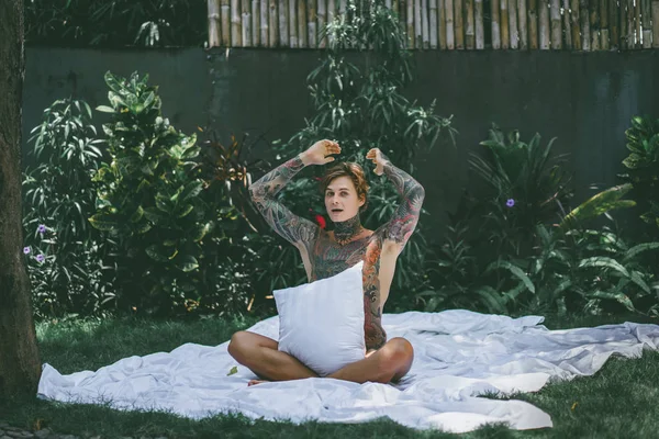 Young Handsome Tattooed Man Morning Bed Tosses Pillows Bed Garden — Stock Photo, Image
