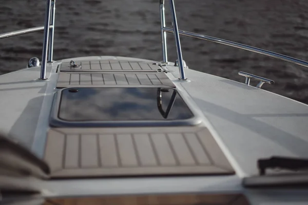 details of the yacht, deck, reflection of the sky.