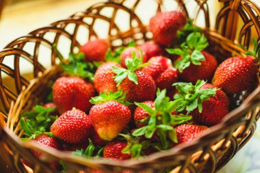 close-up view of fresh strawberries in a basket clipart