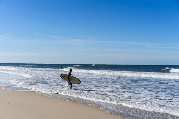 Man Surfer Beach Surfboard Walks Ocean Shore Nazar Portugal — Stock Photo, Image