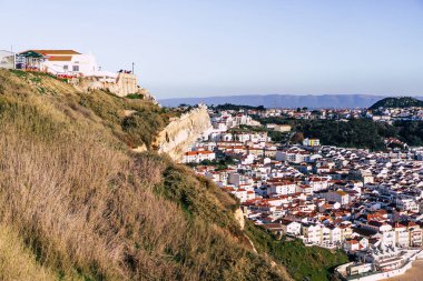 sunset on the ocean, Portugal, Nazar.  clipart