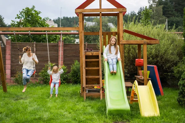 Mother Daughters Spends Time Swing Children Slide Mom Kids Time — Stock Photo, Image