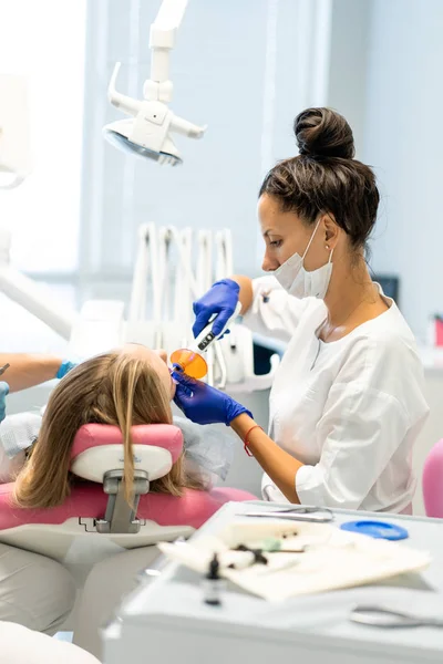 Dentist in the process. Dental services, dental office, dental t — Stock Photo, Image