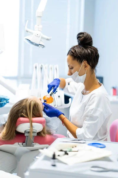 Dentist in the process. Dental services, dental office, dental t — Stock Photo, Image