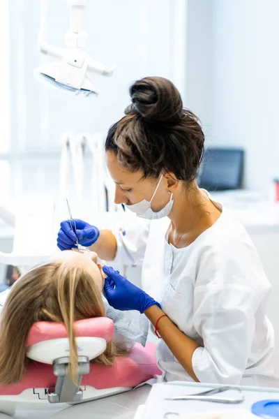 Dentist in the process. Dental services, dental office, dental t — Stock Photo, Image