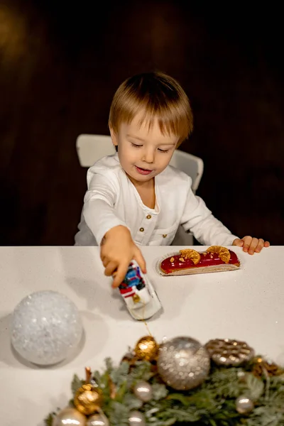 Little Boy Eating Eclairs Childhood Happy Christmas New — Stock Photo, Image