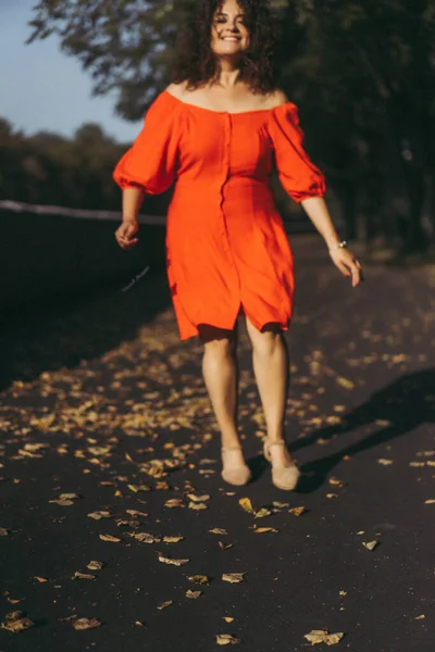 Beautiful Woman Curly Dark Hair Red Dress Walks Autumn City — Stock Photo, Image