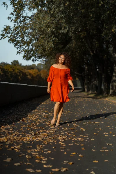 Beautiful Woman Curly Dark Hair Red Dress Walks Autumn City — Stock Photo, Image