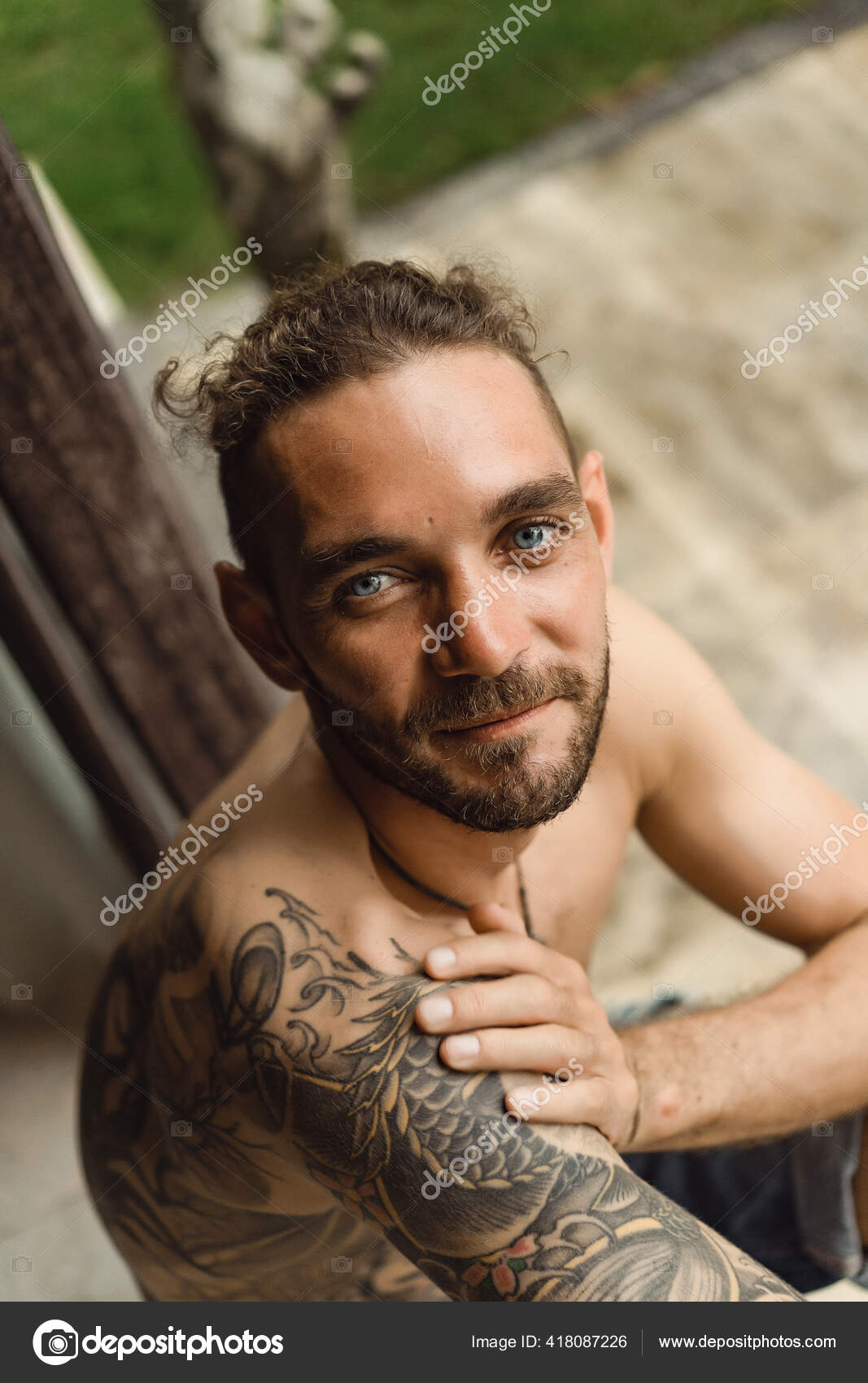 Portrait Of A Nice Young Attractive Man With Blue Eyes Stock Photo