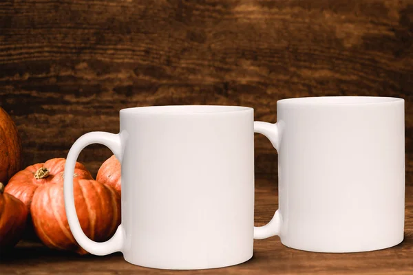 Autumn/Fall 2 mug mock-up. Two white blank coffee mugs to add custom design or quote. Perfect for businesses selling mugs, just overlay your quote or design on to the image.