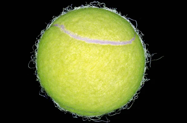 Tennis boll på svart bakgrund — Stockfoto