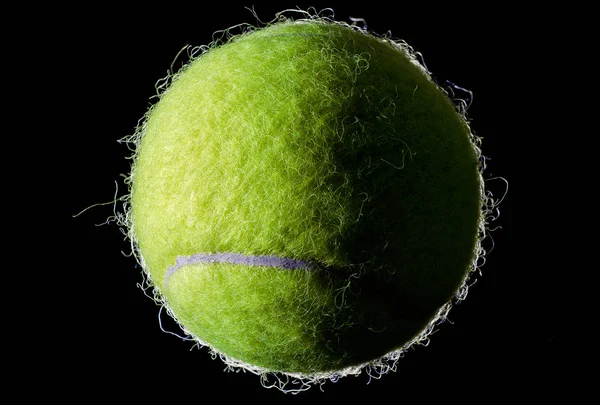 Tennis boll på svart bakgrund — Stockfoto