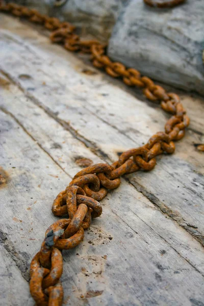 the rusty chain in a boat