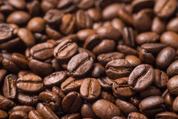 Fullframe pile of brown Roasted coffee beans — Stock Photo, Image